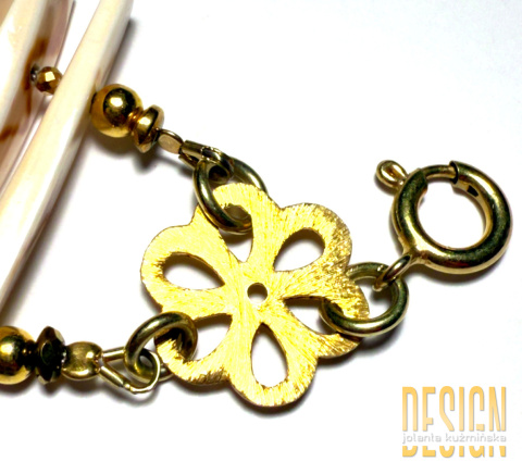 Bransoleta z masy perłowej bogato zdobiona zlotym srebrem